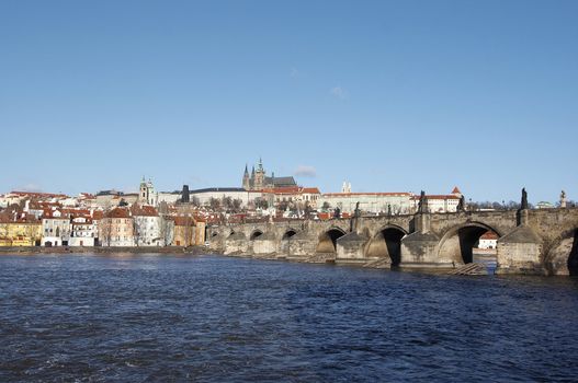 Hradcany - cathedral of St Vitus in Prague castle and Charles bridge.
Cathedral of St Vitus in the Prague castle - the coronation cathedral of the Bohemian sovereigns, and the main of the Prague Roman - Catholic arcidiocese. The Gothic buildings was founded in 1344.
Prague, Czech republic, Europe.  