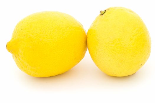 juicy yellow lemons on a white background