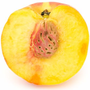 The cut peach on on a white background