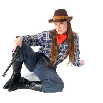 Cowgirl with gun sitting and glares down upon all with the utmost contempt (isolated on white)