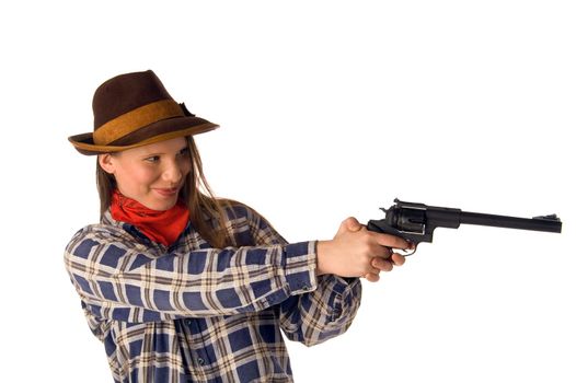 Smiling cowgirl with gun aim at someone (isolated on white)
