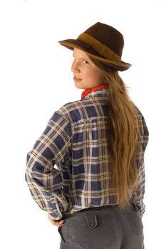 Young woman in cowboy dress looking backward (isolated on white)