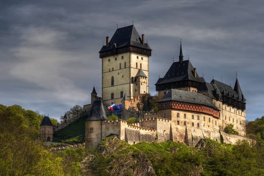 Karlstejn - large Gothic castle founded 1348 by Charles IV. Located about 30 km southwest of Prague above the village named Karlstejn, it is one of the most famous and most frequently visited castles in the Czech Republic. Karlstejn, Czech republic, Europe.