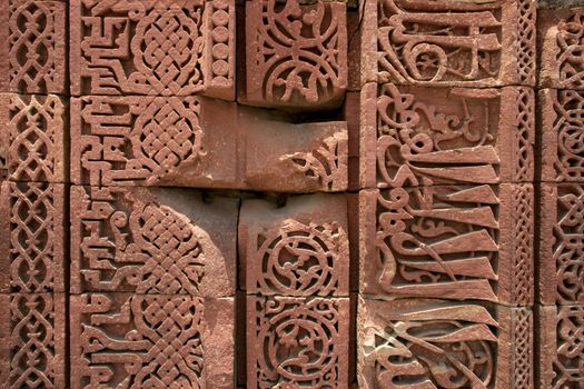 Details of a carved stone monument in Delhi, India.
