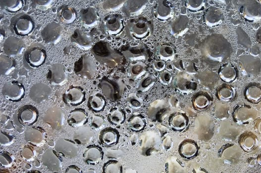 Bubbles of water condensed in a glass