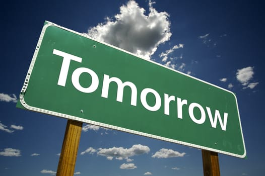 Tomorrow Road Sign with dramatic clouds and sky.