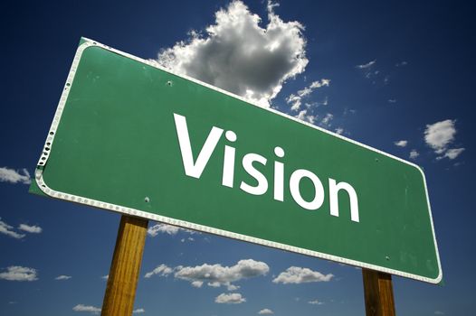 Vision Road Sign with dramatic clouds and sky.