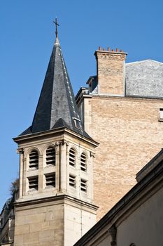 French church surrounded by classical construction in Paris France