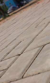 new pavement of stoneblocks (bricks) of grey color