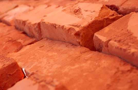 close-up of baked bricks with red surface