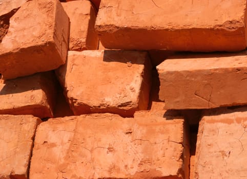 close-up of baked bricks with red surface