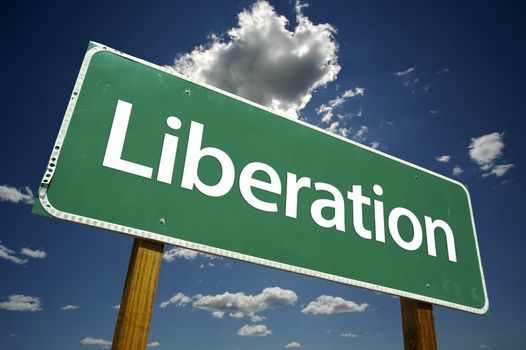 Liberation Road Sign with dramatic clouds and sky.