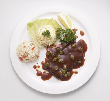 steak with rice and coleslaw ready to serve