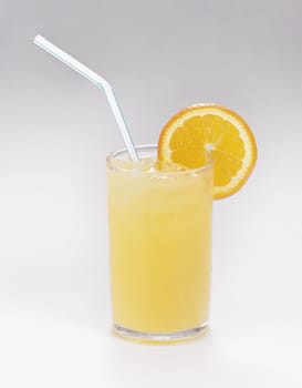 glass of orange juice on the plain background