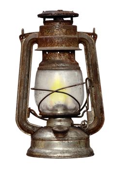 Shot of the antique time-worn kerosene lamp - over white background - isolated