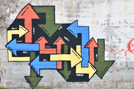 Graffiti arrows sprayed on a wall