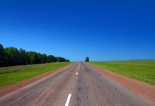 infinity road under blue sky