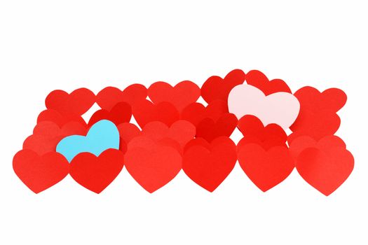 Homosexual couple concept. One blue heart and one pink heart among multitude of red hearts. Isolated with clipping path