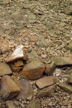 Rocks by the pier. Great for texture backdrop