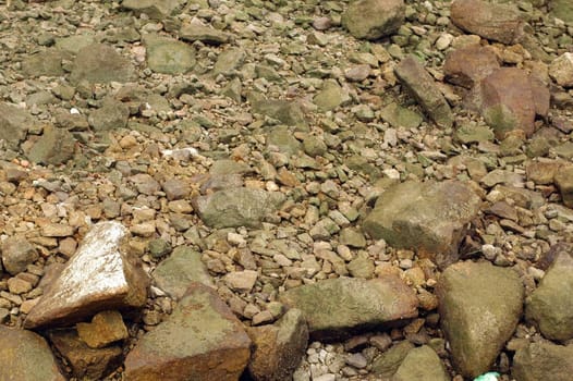 Rocks by the pier. Great for texture backdrop