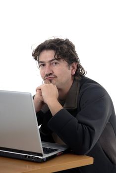 an young man working with personal computer