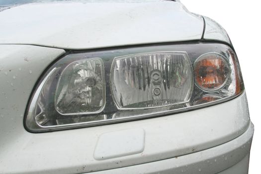 Close-up of wet head light.