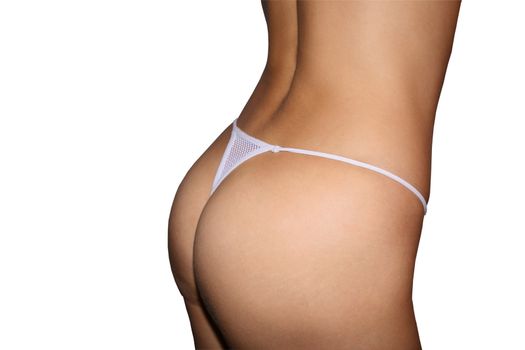 Perfect females buttocks in a white string panties. Isolated on white.
