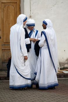 AGLONA, LATVIA - AUGUST 15: Sisters of Missionaries of Charity at the celebration of the Assumption of the Virgin Mary in Aglona, Latvia, August 15, 2008.
