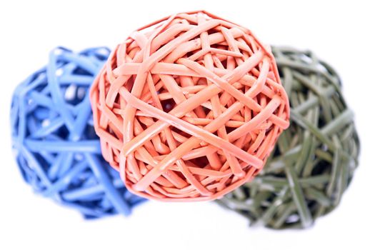 Colorful woven balls isolated on a white background