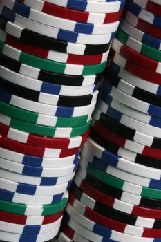 Multi colored poker chips seen up close