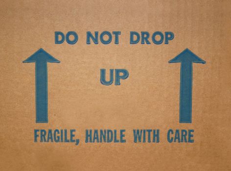 Side of a cardboard box with instructions