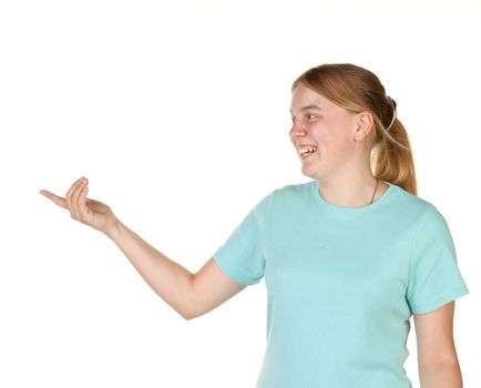 teenage girl gesturing and pointing to copyspace