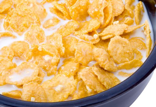 a bowl of cornflakes with milk - healthy diet