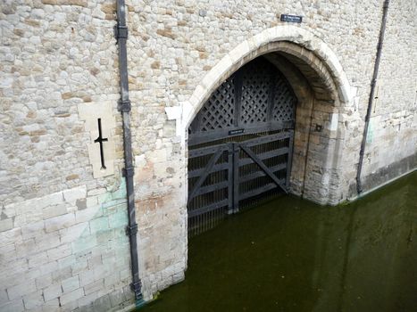 A view of traitors gate which is one of the many gates into the Tower of London. The water in the scene is from the River Thames.