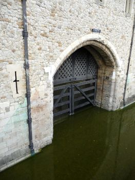 A view of traitors gate which is one of the many gates into the Tower of London. The water in the scene is from the River Thames.