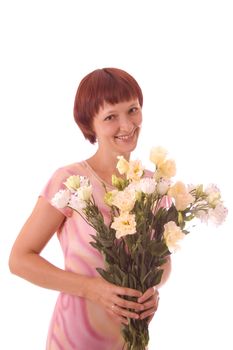 Portrait of red-haired girl with flowers in a high key.