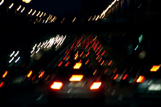 blur vision of traffic lights, urban abstraction, intentional blur.