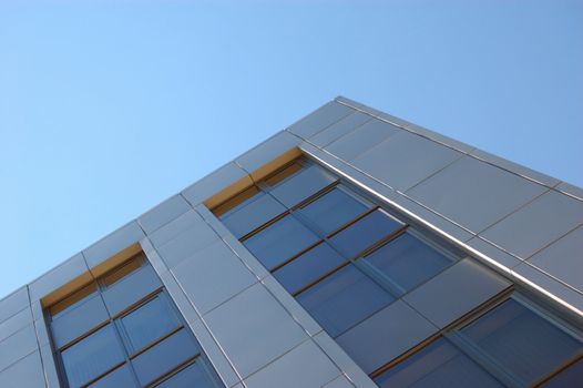 front of new modern office building against sky