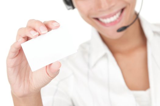 Headset businesswoman holding business card. Beautiful young mixed race chinese / caucasian woman isolated on white background.