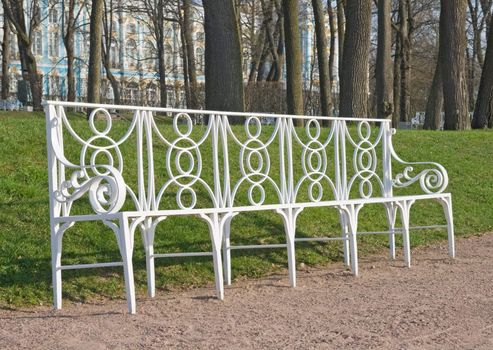 Laced metal bench in a park lane, town of Pushkin, Russia