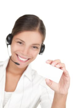Headset woman holding business card. Beautiful young mixed race chinese / caucasian woman isolated on white background.