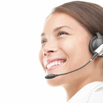 Headset woman in profile - closeup on white background.