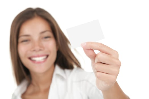 Business card. Casual young and attractive businesswoman showing her blank white business card / empty sign. Mixed race chinese / caucasian model isolated on seamless white background. 