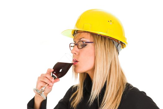 businesswoman with a glass of wine on white background