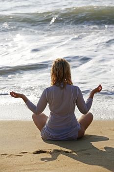 Meditation, girl yoga on the beach