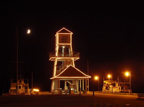 Observatory tower at night on Memphremagog Lake in Magog, Province of Quebec, Canada
