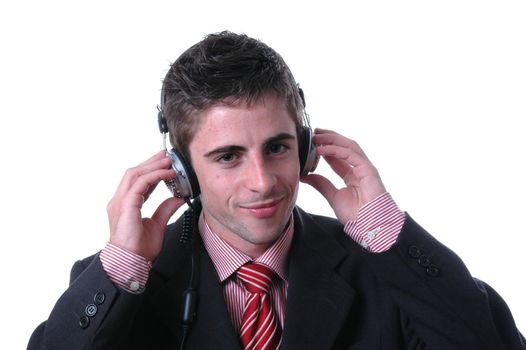 young businessman listen music on white