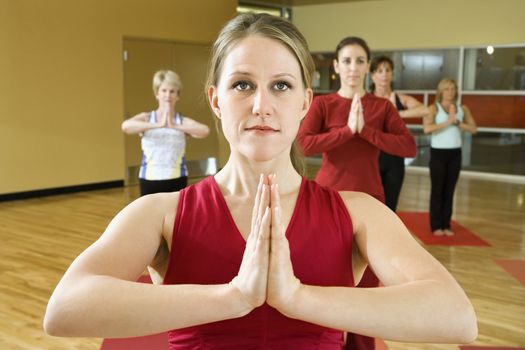 Prime adult female Caucasians in yoga class.