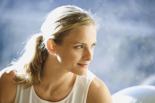 Portrait of prime Caucasian female adult at gym.