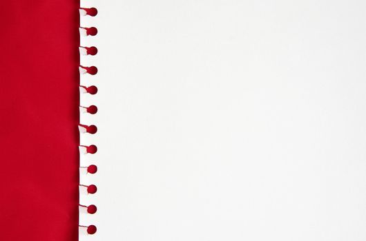 White paper in a red background 